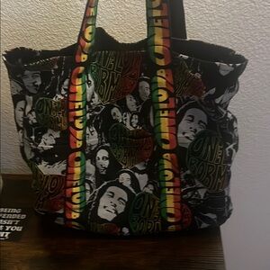 Zion Rootswear Black and Red Hobo Bag with Artistic Flair